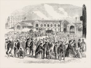 VIEW OF BRITISH EXCURSIONISTS TO PARIS: EXCURSIONISTS LEAVING THE PARIS STATION OF THE GREAT