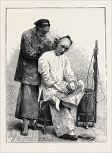 LIFE IN CHINA: A STREET BARBER