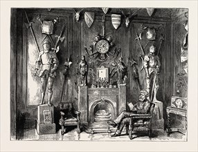 THE DINING ROOM IN SIR NOEL'S HOUSE IN EDINBURGH, SHOWING SOME OF HIS FINE COLLECTION OF ARMOUR
