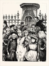 FREE EDUCATION, CHILDREN DRINKING AT A FOUNTAIN OUT OF SCHOOL HOURS