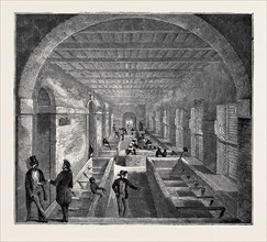THE INDO-CHINESE OPIUM TRADE, AT AN OPIUM FACTORY AT PATNA: THE MIXING ROOM