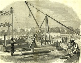 Hyde Park, London, 1850. The Great Exhibition building. Unloading girders