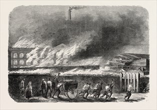 Spinning wool and silk factory in flames, M. Th Cheneviere, Elbeuf, France. Seine-Maritime,