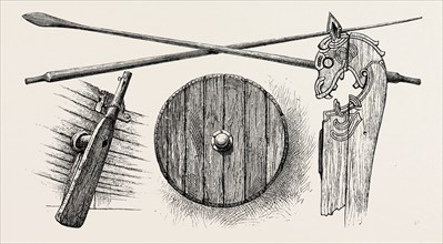 THE VIKING'S SHIP: THE RUDDER, OARS, A SHIELD AND ONE OF THE TILT-HEADS