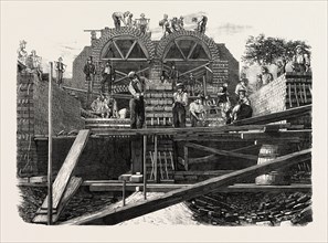 MAIN DRAINAGE OF THE METROPOLIS. SECTIONAL VIEW OF THE TUNNELS FROM WICK LANE, NEAR OLD FORD, BOW,