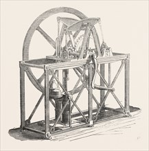 WELL ENGINE. BY TYLOR AND SON. This is a well-engine pump, fixed in an iron frame, intended to