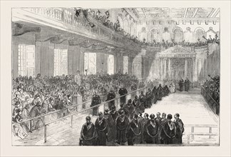 CONFERRING DEGREES IN THE SENATE HOUSE, CAMBRIDGE: PRESENTING THE WOODEN SPOON, ENGRAVING 1876, UK,