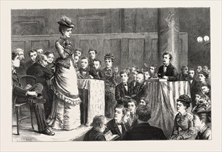 A SPELLING BEE: A FAIR COMPETITOR PUZZLED. ENGRAVING 1876, UK, britain, british, europe, united
