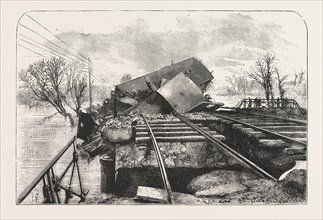 TERRIBLE RAILWAY ACCIDENT IN ALSACE, CAUSED BY THE FALL OF THE BRIDGE OF LUTTERBACH AT THE MOMENT