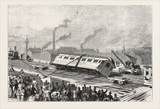 THE ACCIDENT TO THE FLYING SCOTCHMAN,  NEAR SHEFFIELD: RAISING THE PULLMAN CAR, ENGRAVING 1876, UK,