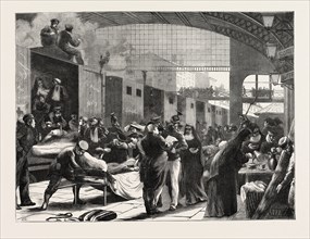 FRANCO-PRUSSIAN WAR: SCENE AT A RAILWAY STATION ON THE ARRIVAL OF A TRAIN WITH WOUNDED PEOPLE, 1870