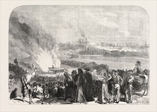 THE REVOLUTION IN SPAIN: BURNING THE GAROTTING SCAFFOLD AT MADRID, 1868
