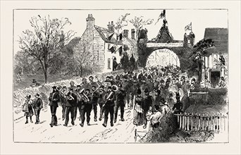 THE PROCESSION ENTERING THE VILLAGE, GOLDEN WEDDING OF LORD AND LADY CRANBROOK AT HEMSTED PARK,