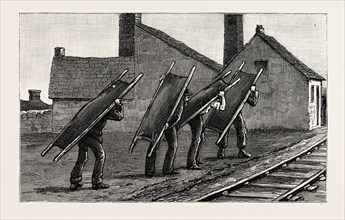 Colliery explosion at LLanerch, Monmouthshire, MORE STRETCHERS, engraving 1890, UK, U.K., Britain,