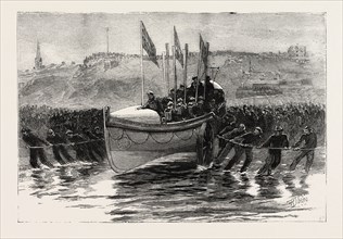 THE LAUNCH OF A NEW LIFEBOAT AT CULLERCOATS  NORTHUMBERLAND, ENGRAVING 1884, UK, britain, british,