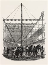 RAISING THE GIRDERS OF THE CENTRAL AISLE OF THE CRYSTAL PALACE, THE GREAT EXHIBITION, LONDON, UK,
