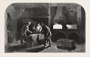 THE MANUFACTURE OF GUN BARRELS, AT BIRMINGHAM, UK: WELDING THE GUN BARRELS, 1851 engraving