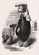 ARAB GIRL RETURNING FROM THE BATH, CAIRO, EGYPT, FROM CHARACTERS, COSTUMES AND MODES OF LIFE IN THE