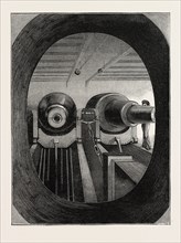 A PEEP INTO THE TURRET OF THE SHIP DEVASTATION, WHERE TWO CANNONS CAN BE SEEN, 1873 engraving