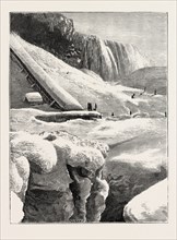 THE NIAGARA FALLS IN WINTER TIME: ICE MOUNTAIN AND AMERICAN FALL, 1873 engraving