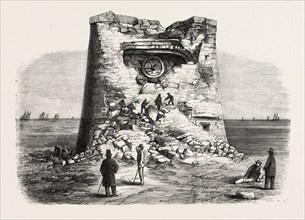 DESTRUCTION OF THE MARTELLO TOWER, EASTBOURNE, SUSSEX, BY SIR W. ARMSTRONG'S GUNS, AT A DISTANCE OF