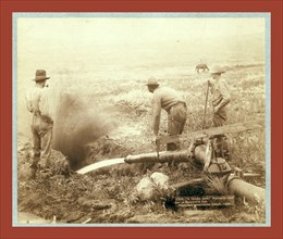 A Golden work. Hydroulic [sic] mining at Rockdrville [i.e. Rockerville], Dak., John C. H. Grabill