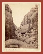 Our picnic party at Sunday Gulch. Photographed between the walls of the grandest mountains of the