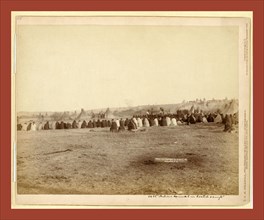 Indian Council in Hostile Camp, John C. H. Grabill was an american photographer. In 1886 he opened