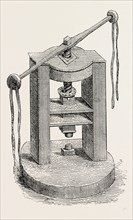 PRESS AND DIES FORMERLY USED IN THE MINT, London, UK, 19th century engraving
