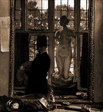 Artist with sculpture reflected in mirror, Interiors, Reflections, Artists, 1900