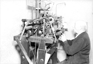 Philadelphia, Pennsylvania - Hosiery. Minnesac Mills. [Man working at machine.], May 1937, Lewis