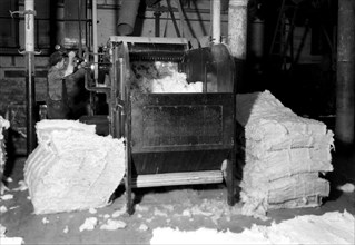 Manchester, New Hampshire - Textiles. Pacific Mills. Opener picker. Cotton from several bales of