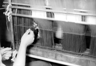 Paterson, New Jersey - Textiles. Wishnack Silk Company. Picture of a warp being entered. Shows the