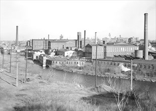 Paterson, New Jersey - Textiles. Madison Silk Co. Passaic River and old silk mill section, March