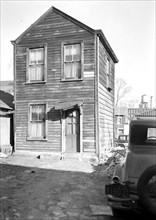 Paterson, New Jersey - Textiles. Two-room home, (kitchen below, bedroom above) of an old retired