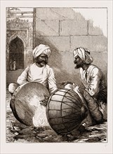 PREPARING FOR THE PRINCE: TUNING THE TOM-TOMS AT JAMMU, INDIA, 1876