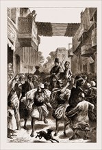CAIRO, EGYPT, 1876: CLEARING THE WAY FOR LADIES OF THE KHEDIVE'S HAREM