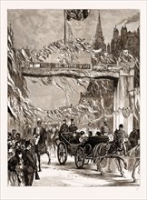 THE QUEEN'S VISIT TO THE EAST END, LONDON, UK, 1876: THE PROCESSION PASSING THE TRIUMPHAL ARCH AT