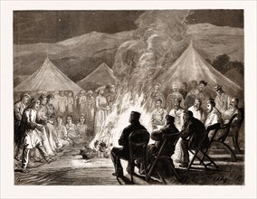 THE PRINCE OF WALES IN THE TERAI: THE CAMP FIRE: THIBETANS DANCING, 1876