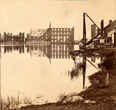 Ruins of the burnt district, from the canal basin, Richmond, Va., looking east, USA, US, Vintage