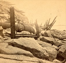 View of Fort Sumpter (i.e. Sumter), showing the debris, shot, shell, and broken guns. Fort Sumter