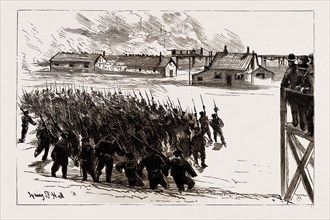 NAVAL SHAM FIGHT AT WHALE ISLAND, PORTSMOUTH, UK, 1886, WITNESSED BY NUMEROUS MEMBERS OF THE HOUSE