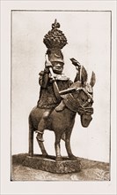 This casting of a former King of Benin was made by natives of Benin City, and was presented by the