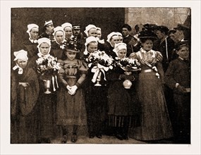 THE PRESENTATION OF "DRUMMOND CASTLE" MEDALS: BRETON CHILDREN WITH BOUQUETS FOR THE FRENCH AND