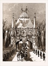 THE ROYAL WEDDING IN BERLIN, GERMANY, 1881: THE CORTEGE PASSING THROUGH THE MEDIAEVAL GATE IN