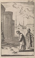 On a square two Turks are walking towards a mosque where before the entrance are a few pairs of