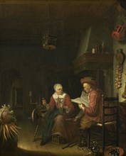 Interior with a man reading and a woman spinning yarn, Domenicus van Tol, 1660 - 1676
