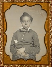 [Portrait of a Seated Black Child with Hands Crossed]