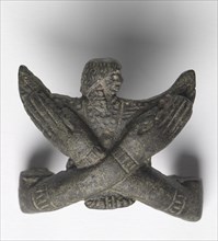 Bronze mount from a "Shawabty Bundle": Crossed Arms, c. 1336-1256 BC. Egypt, Thebes, Wadi Qubbanet