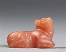 Recumbent Calf Amulet, 1540-1296 BC. Egypt, New Kingdom, Dynasty 18. Carnelian; overall: 1.7 cm